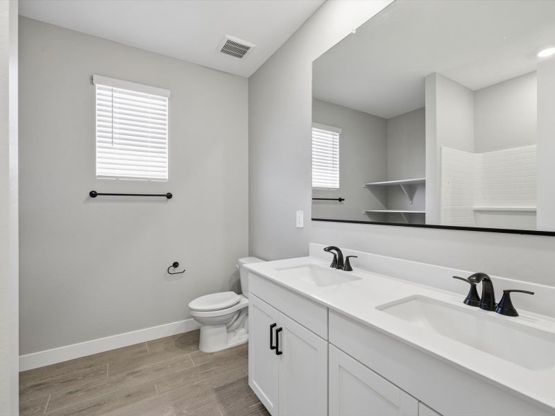 Furnished interior view inside a new home in Blossom Rock Reserve Series, Apache Junction (Image 1). Furnished interior view inside a new home in Blossom Rock Reserve Series, Apache Junction (Image 1).