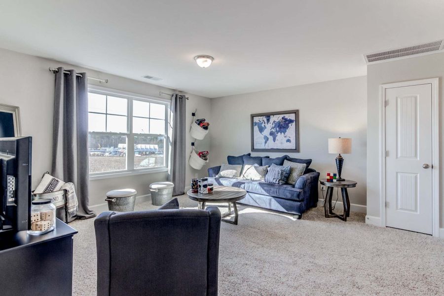 Representative furnished interior of a home built from the Drayton by Caviness & Cates Communities in Bartlett Manor, Youngsville (Image 198).