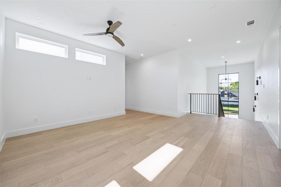 Upstairs game room with built in desk and powder bath for guest. Upstairs game room with built in desk and powder bath for guest.