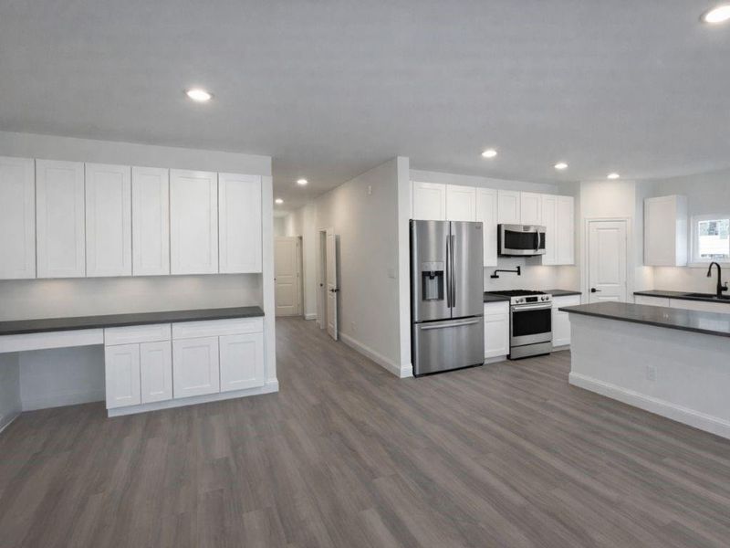 Furnished interior view inside a new home in Hill & Dale Ranch, Splendora (Image 3).
