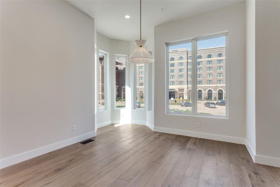 Beautiful dining with bay window and lots of light Beautiful dining with bay window and lots of light