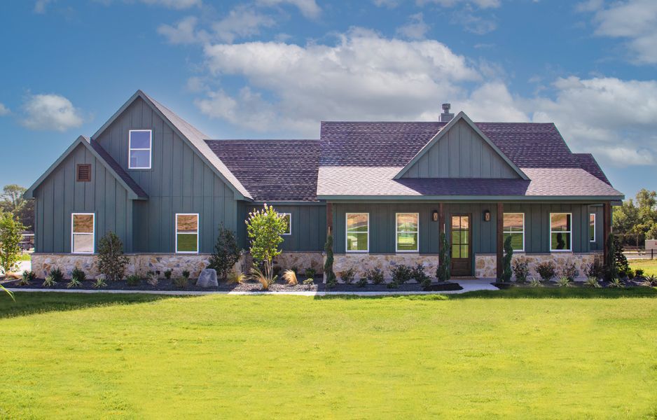 Representative exterior photo of a completed home built from the Manor Farm House by Trinity Classic Homes in Zion Trails, Poolville, TX (Image 2). Representative exterior photo of a completed home built from the Manor Farm House by Trinity Classic Homes in Zion Trails, Poolville, TX (Image 2).