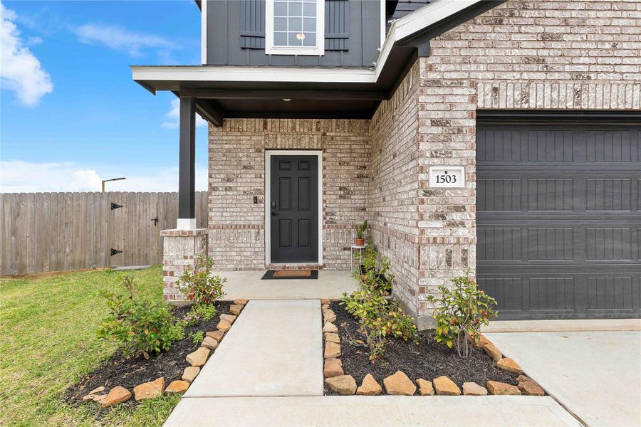 Exterior details and patio area of a home in Sweetgrass Village, Crosby (Image 27).