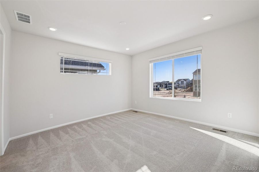 Spacious, unfurnished interior of a new home in The Villas Collection at Sterling Ranch, Littleton (Image 27).