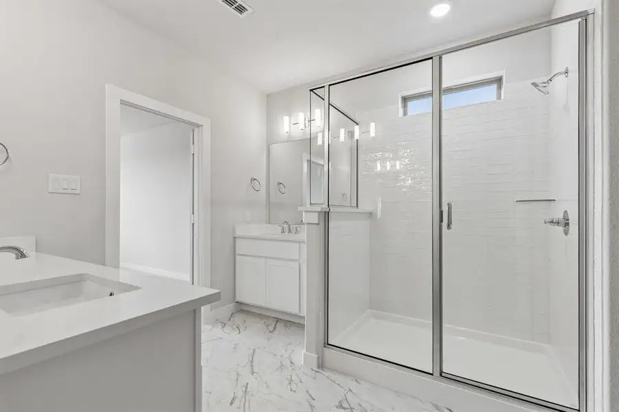 Primary Bathroom in the Winters home plan by Trophy Signature Homes – REPRESENTATIVE PHOTO Primary Bathroom in the Winters home plan by Trophy Signature Homes – REPRESENTATIVE PHOTO