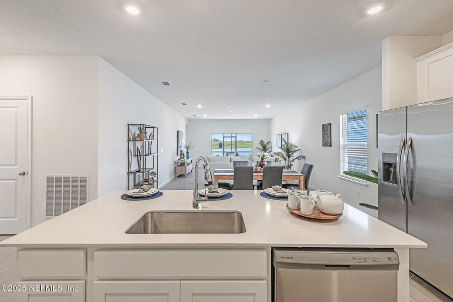 Furnished interior view inside a new home in Edenbrooke at Hyland Trail | 55+: Edenbrooke at Hyland Trail 50s, Green Cove Springs (Image 12). Furnished interior view inside a new home in Edenbrooke at Hyland Trail | 55+: Edenbrooke at Hyland Trail 50s, Green Cove Springs (Image 12).