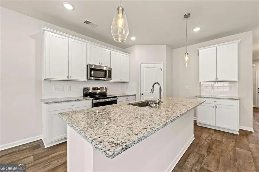 Furnished interior view inside a new home in The Grove At Mundy Mill, Gainesville (Image 6).