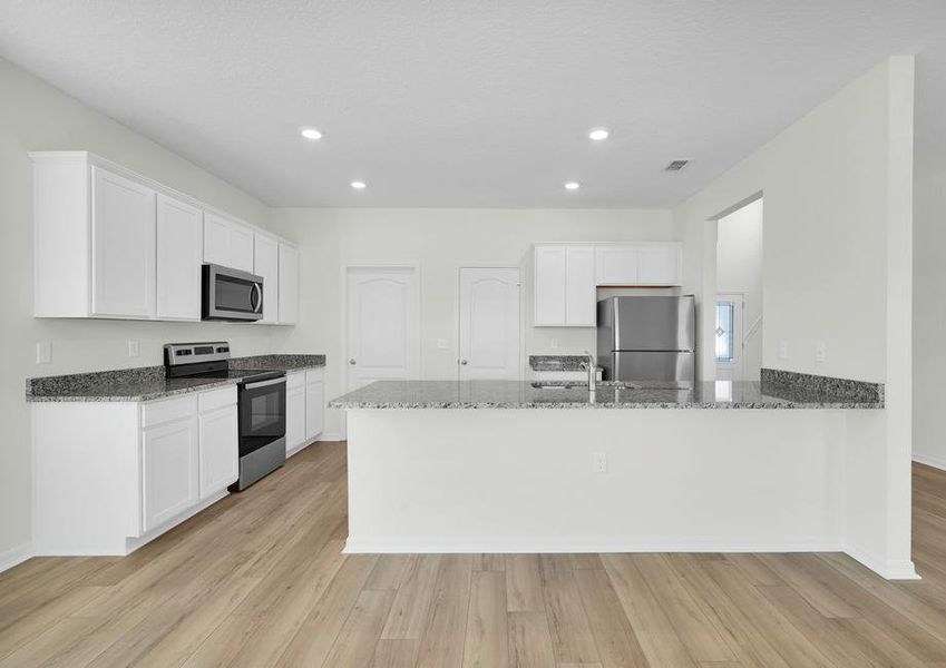 Each kitchen includes stainless steel appliances