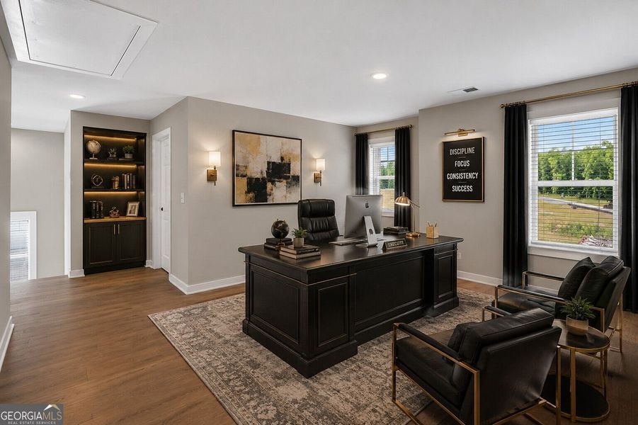 Furnished interior view inside a new home in The Fairways at Mirror Lake, Villa Rica (Image 30).