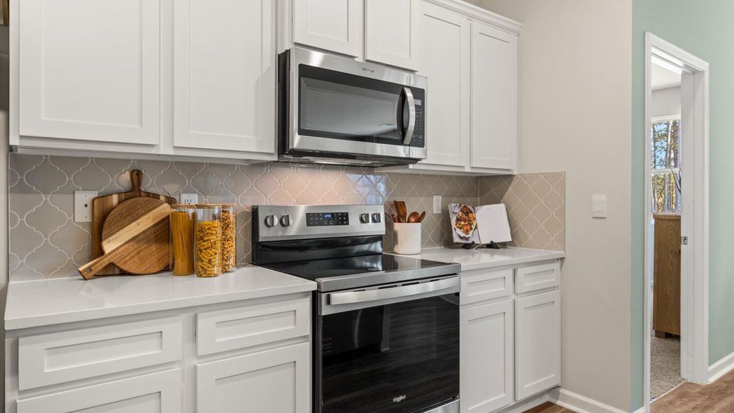 Representative furnished interior of a home built from the ARIA Express by D.R. Horton in WillowBrook, Winder (Image 9).