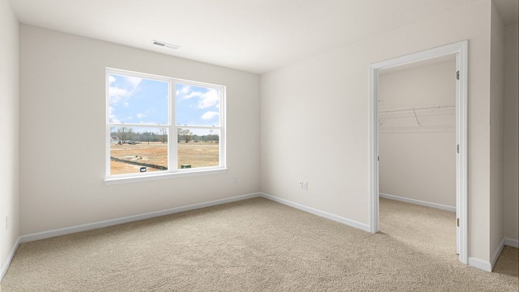 Spacious, unfurnished interior of a new home in The Townes at Honeycutt Oaks, Angier (Image 11). Spacious, unfurnished interior of a new home in The Townes at Honeycutt Oaks, Angier (Image 11).