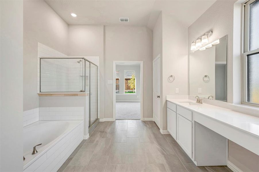 Furnished interior view inside a new home in Lily Creek at Sutton Fields, Aubrey (Image 9).