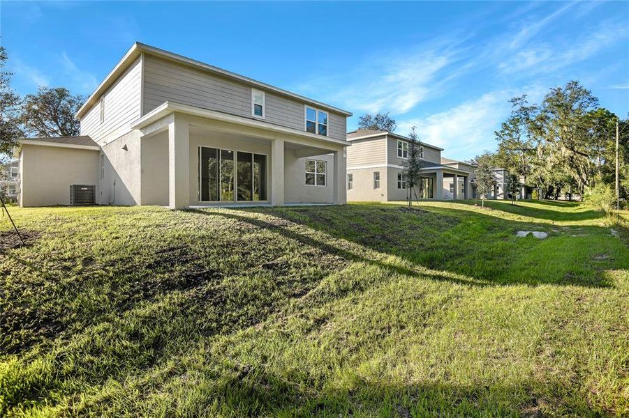 Exterior details and patio area of a home in Seasons at Wekiva Ridge, Mount Dora (Image 4).