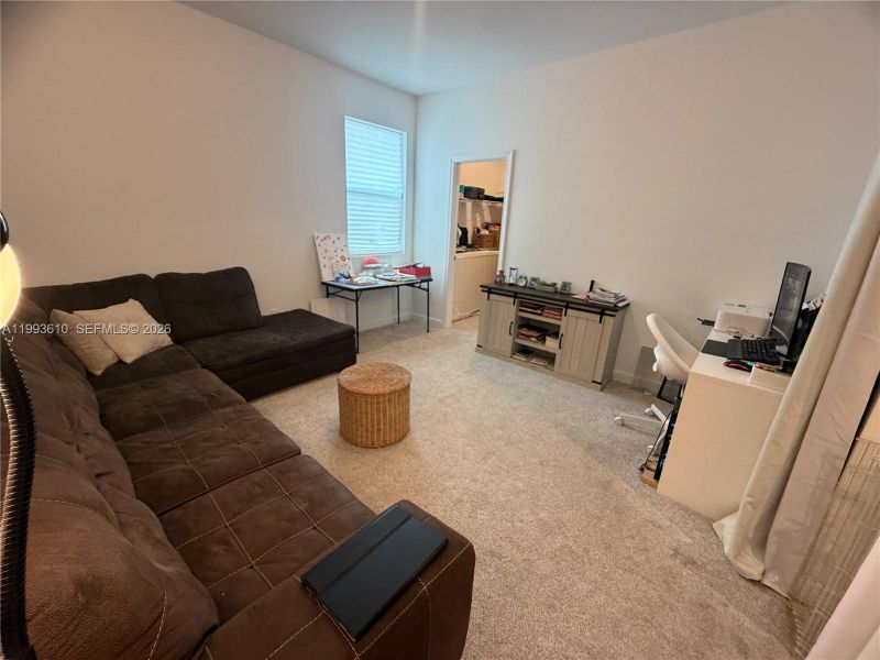 Furnished interior view inside a new home in Tradition, Port St. Lucie (Image 11).
