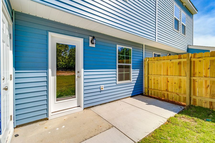 Exterior details and patio area of a home in Padgett Commons, Hopkins (Image 3).