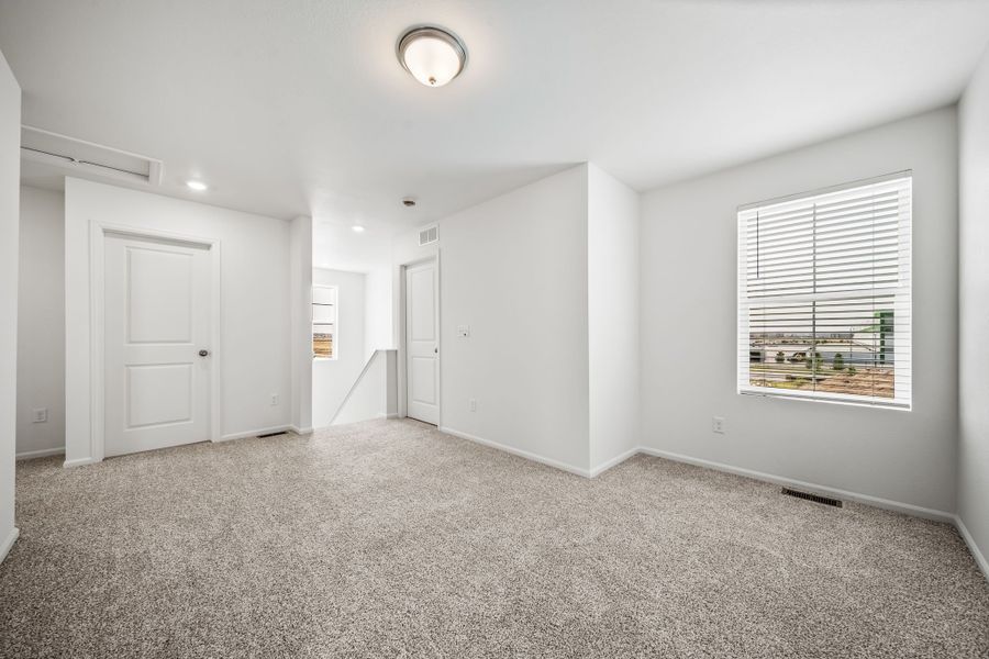 Spacious, unfurnished interior of a new home in Reunion, Commerce City (Image 27). Spacious, unfurnished interior of a new home in Reunion, Commerce City (Image 27).