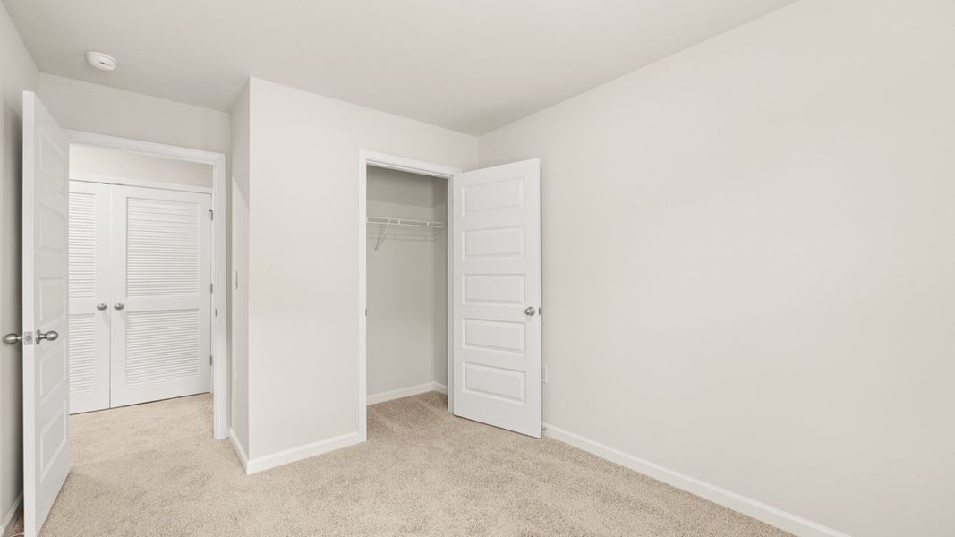 Spacious, unfurnished interior of a new home in Young's Crossing, Stone Mountain (Image 26).