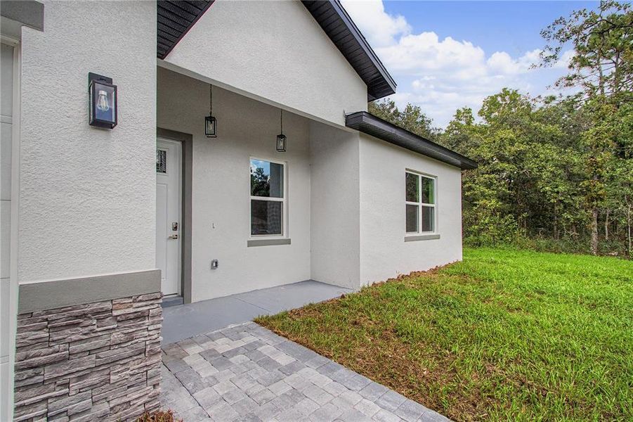 Exterior details and patio area of a home in , Ocala (Image 28).
