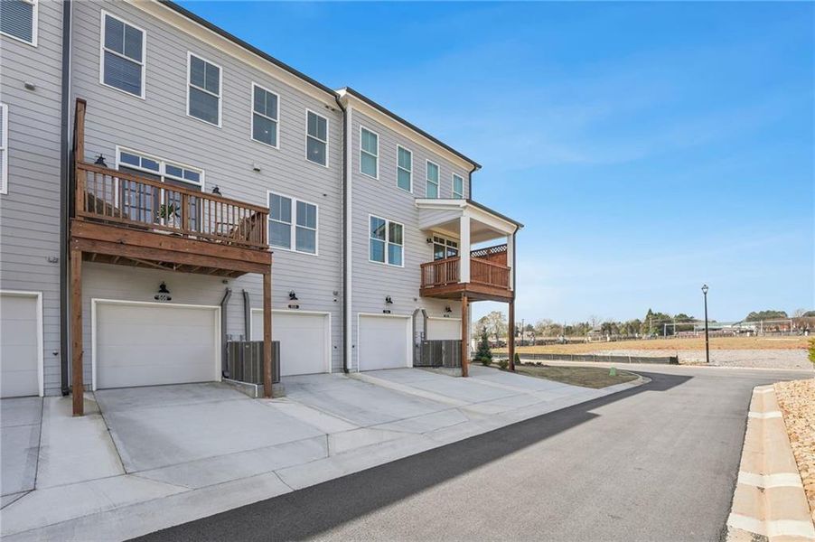 Exterior details and patio area of a home in Market Square at Sawnee Village, Cumming (Image 23).