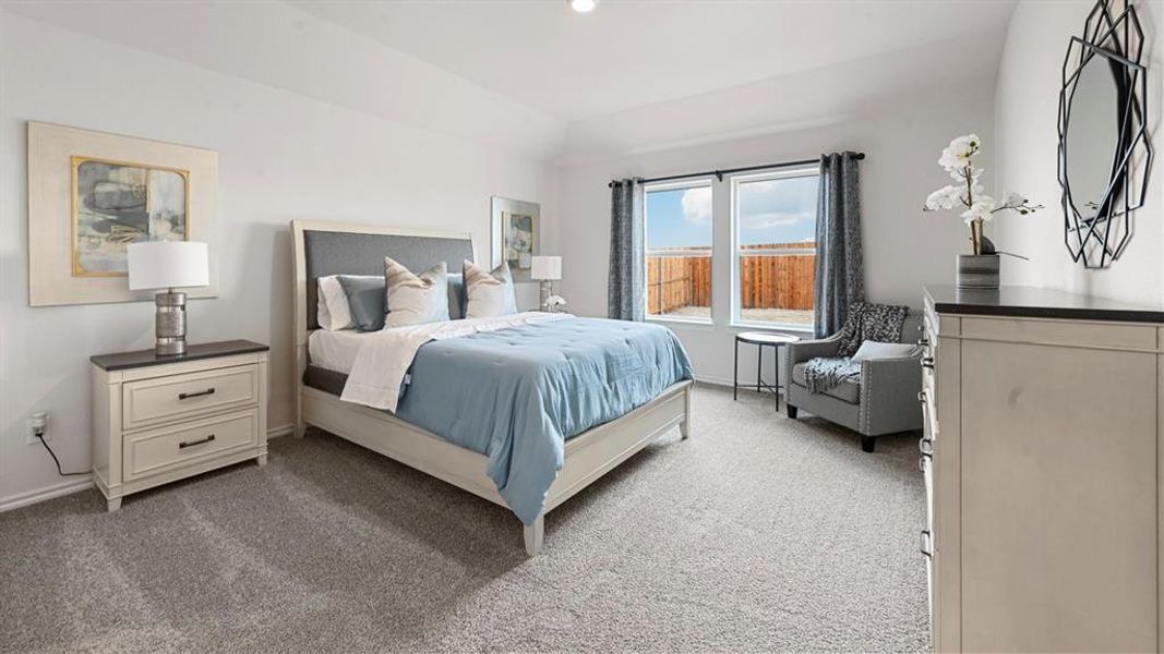 Bedroom with light carpet and baseboards Bedroom with light carpet and baseboards