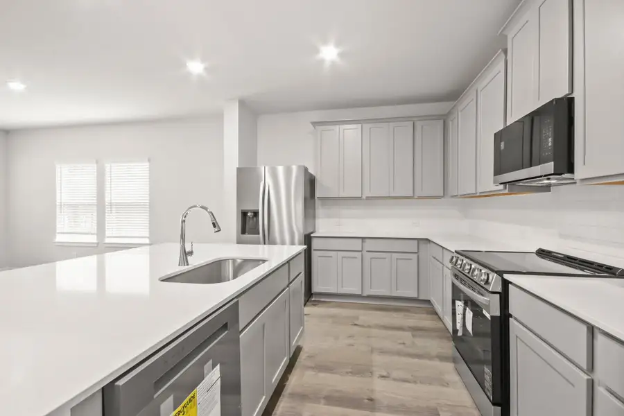 Furnished interior view inside a new home in Oakwood Ranch, Willis (Image 9).