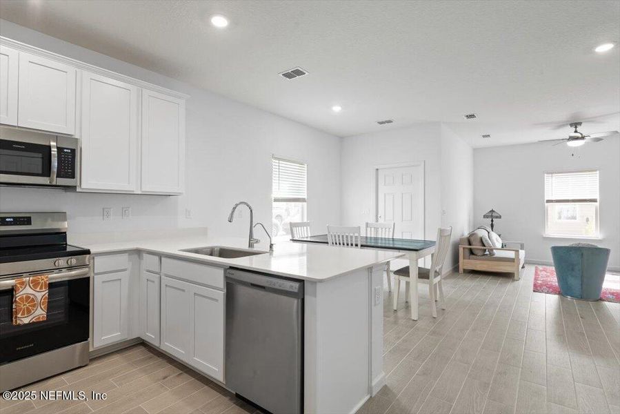 Furnished interior view inside a new home in Hardwick Farms: Hardwick Farms - Townhome Collection, Jacksonville (Image 38).