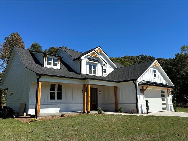 Front exterior of a new home in , Maysville, GA, highlighting curb appeal (Image 2).
