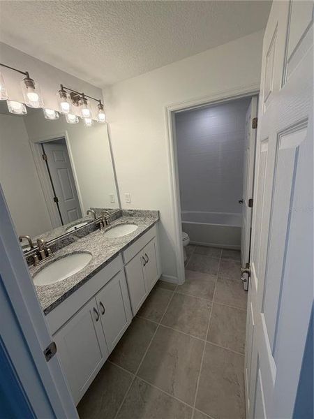 Furnished interior view inside a new home in Eagletail Landings, Howey-in-the-Hills (Image 4).