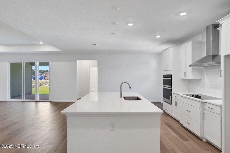 Furnished interior view inside a new home in Hyland Trail, Green Cove Springs (Image 7).