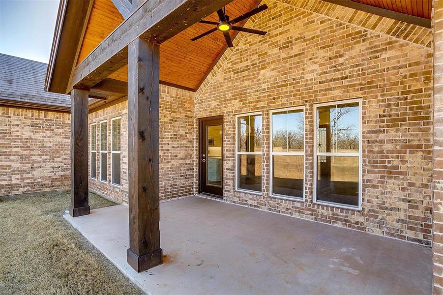 View of patio featuring ceiling fan