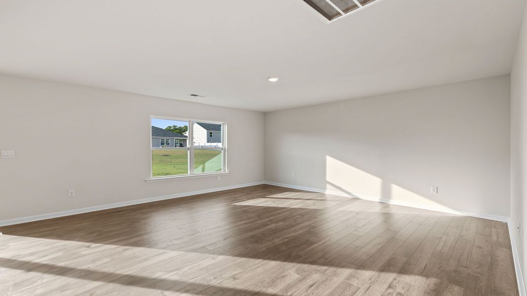 Spacious, unfurnished interior of a new home in Bentley Park, Greenwood (Image 20).