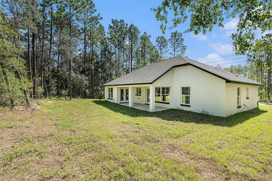 Front exterior of a new home in , Citrus Springs, FL, highlighting curb appeal (Image 15).