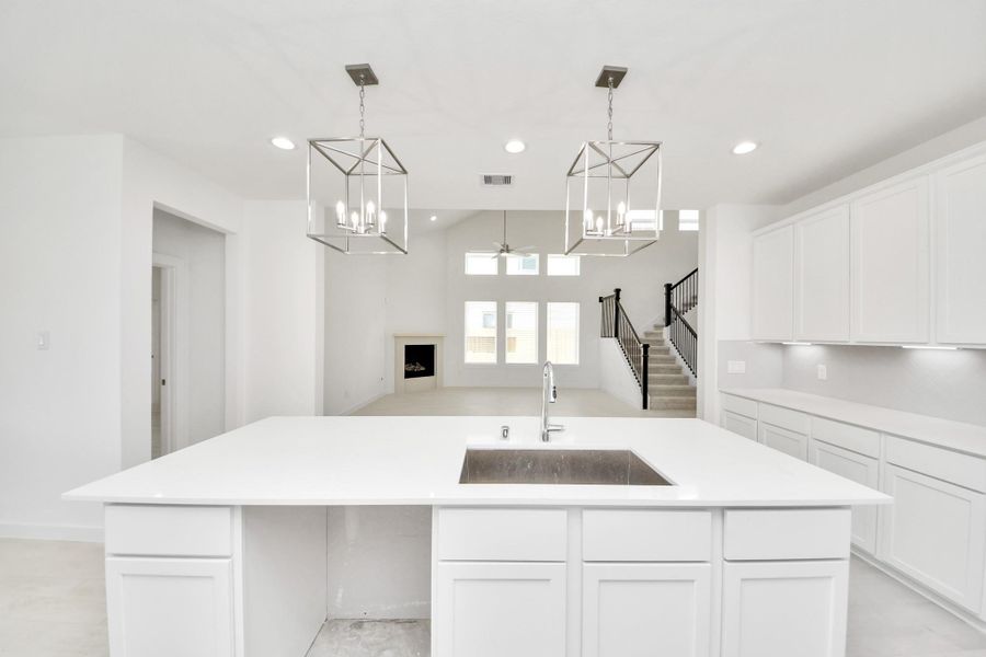 All of this overlooks your expansive family room, creating a perfect space for culinary delights and family gatherings. All of this overlooks your expansive family room, creating a perfect space for culinary delights and family gatherings.
