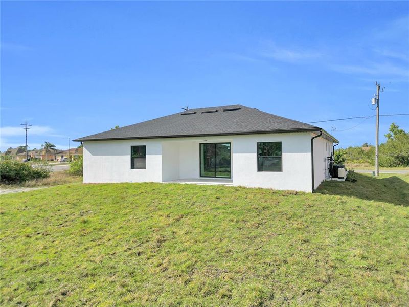 Exterior details and patio area of a home in , Lehigh Acres (Image 2). Exterior details and patio area of a home in , Lehigh Acres (Image 2).