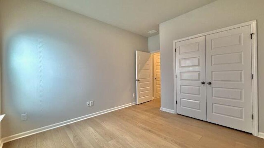 Spacious, unfurnished interior of a new home in Horizons at Summers Corner | 55+, Summerville (Image 25).