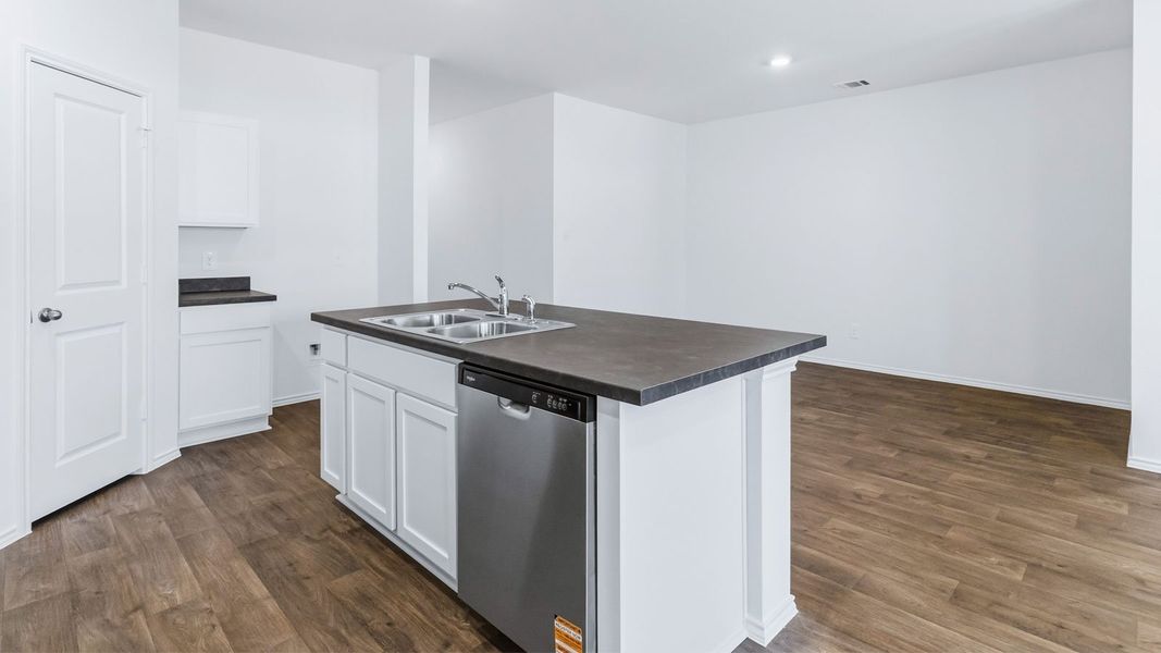 Furnished interior view inside a new home in Wayside, Uhland (Image 9).