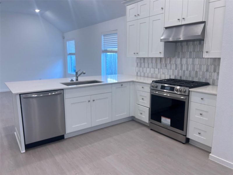 This is a view of the beautiful white cabinets This is a view of the beautiful white cabinets