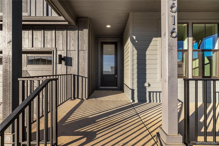 Exterior details and patio area of a home in West Grange, Longmont (Image 29).