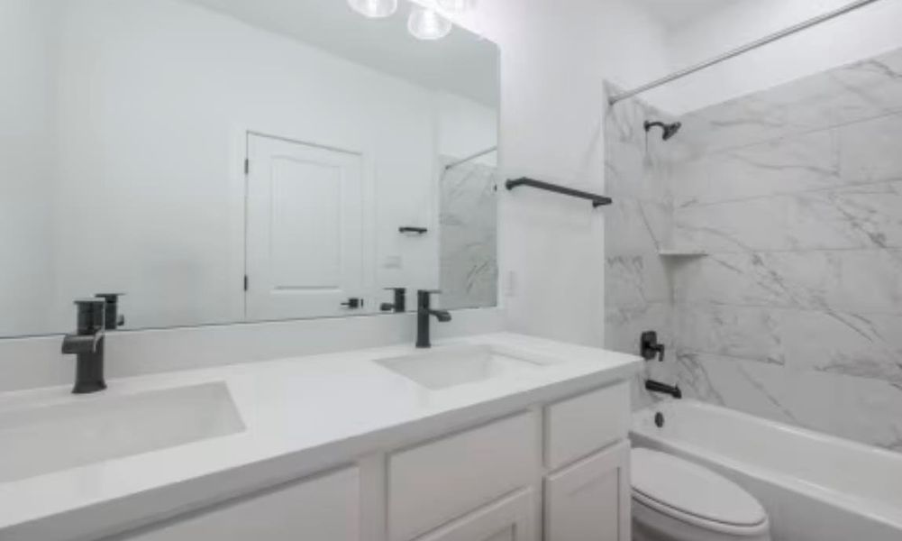 Furnished interior view inside a new home in Ryegrass Collection – Freedom at Anthem, Kyle (Image 6).