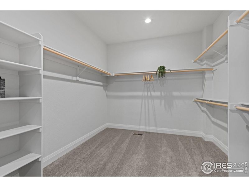 The luxury primary closet has a lot of space