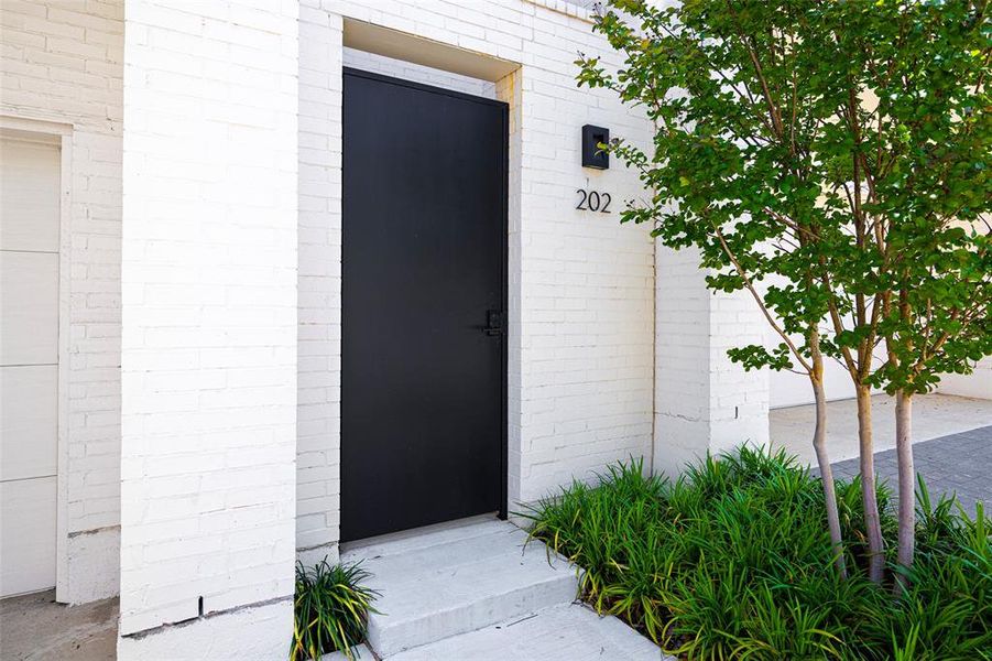 Front exterior of a new home in , Dallas, TX, highlighting curb appeal (Image 21).