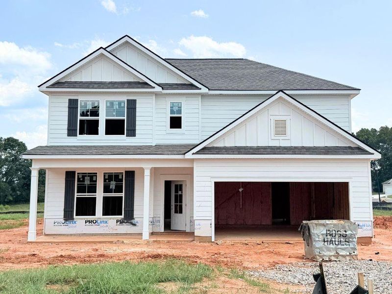 Front exterior of a new home in Westlyn, Winder, GA, highlighting curb appeal (Image 1). Front exterior of a new home in Westlyn, Winder, GA, highlighting curb appeal (Image 1).