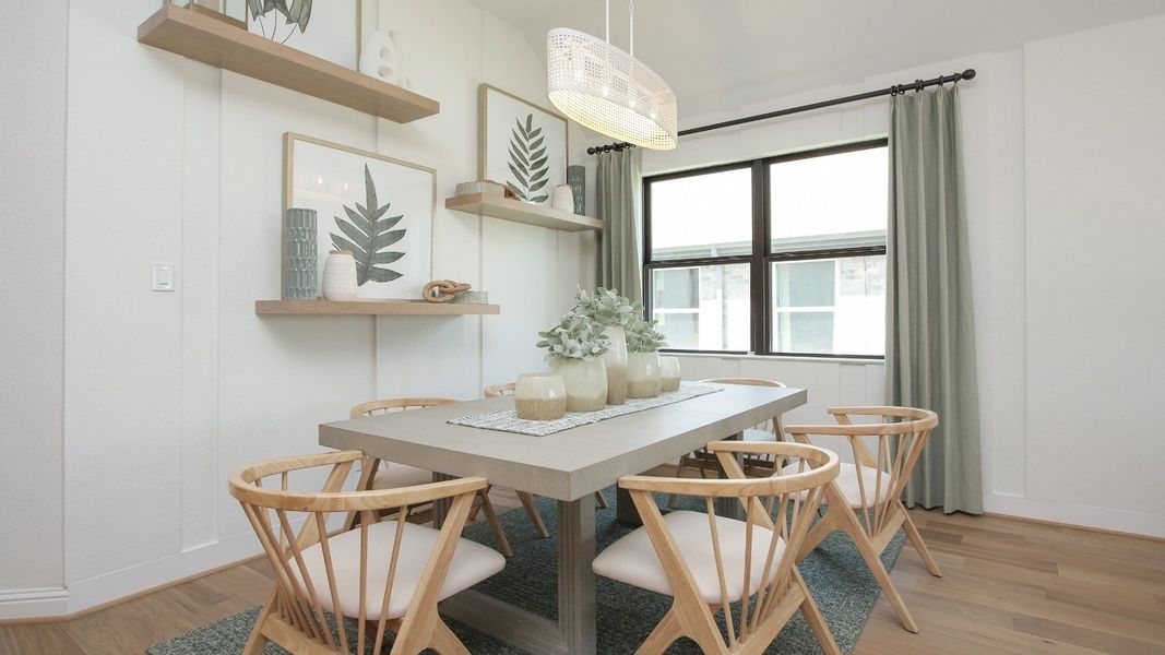 Representative furnished interior of a home built from the Juniper by Brightland Homes in Sunterra, Katy (Image 6).