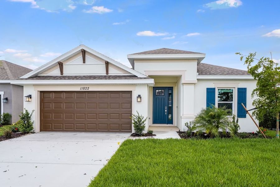 Representative exterior photo of a completed home built from the Saint Thomas by Taylor Morrison in Central Park, Port St. Lucie, FL (Image 22).