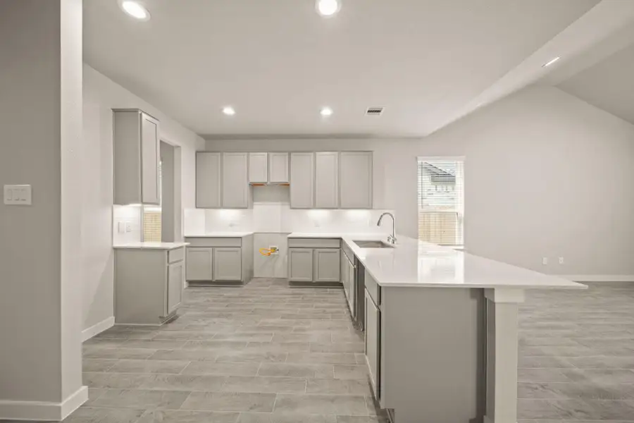 Furnished interior view inside a new home in Barton Creek Ranch, Conroe (Image 3).