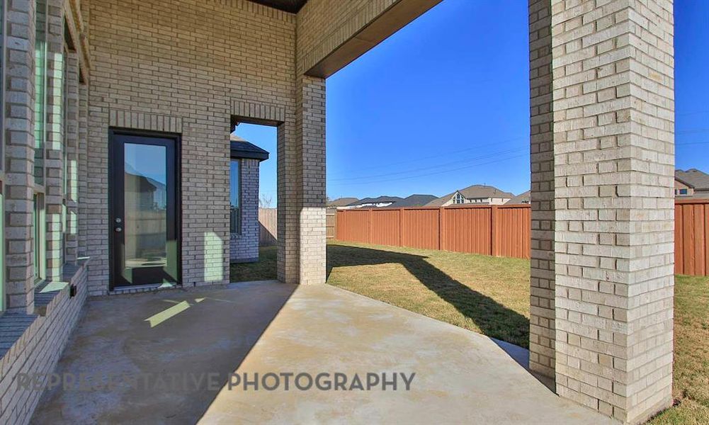 Exterior details and patio area of a home in Star Trail, Prosper (Image 2).