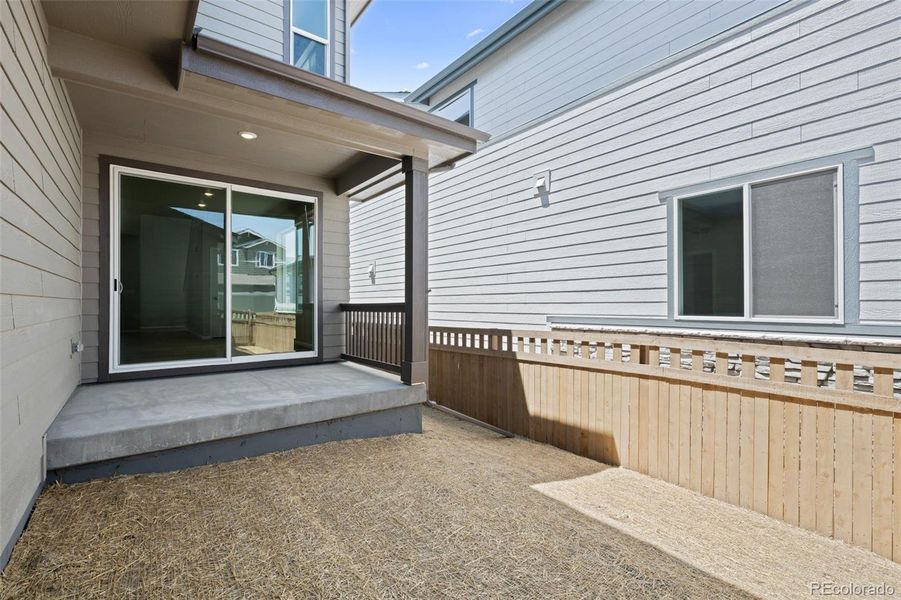 Front exterior of a new home in Painted Prairie, Aurora, CO, highlighting curb appeal (Image 32).