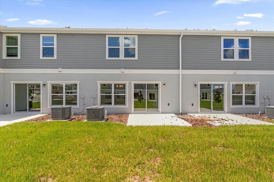Front exterior of a new home in , Lake Wales, FL, highlighting curb appeal (Image 8).