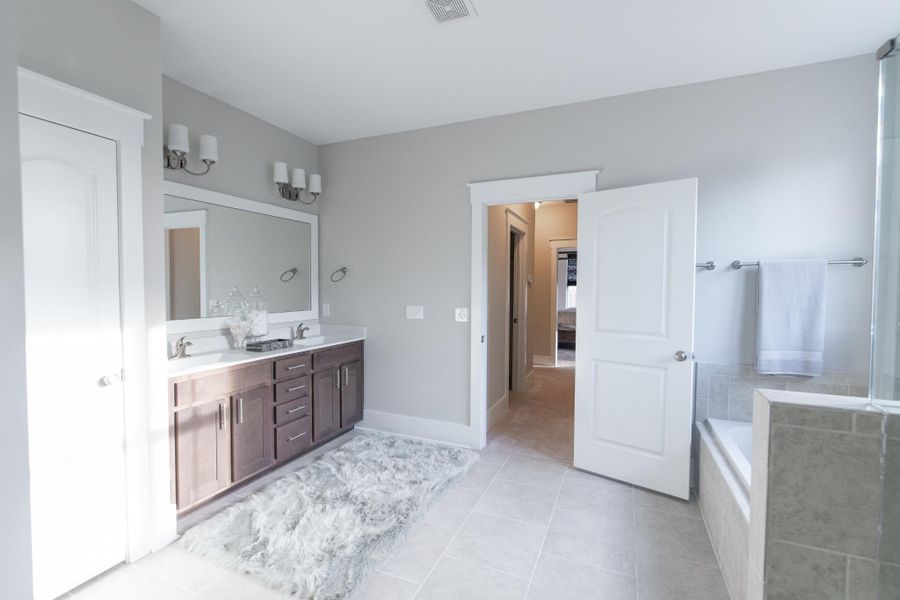 Representative furnished interior of a home built from the McKinley by Bill Clark Homes in The Sanctuary at Sunset Beach, Sunset Beach (Image 78). Representative furnished interior of a home built from the McKinley by Bill Clark Homes in The Sanctuary at Sunset Beach, Sunset Beach (Image 78).