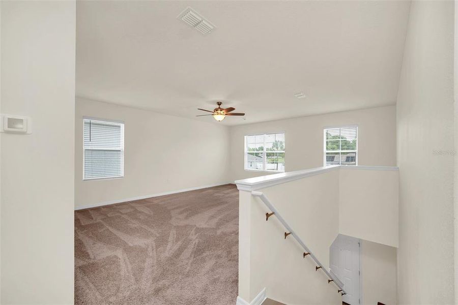 Spacious, unfurnished interior of a new home in Greenbrier, Tavares (Image 18).